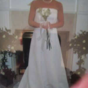 SOLD ELEGANT, HAND STITCHED, DETAIL WEDDING GOWN.